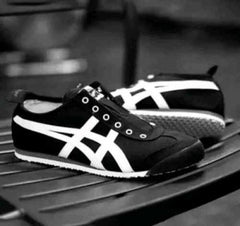 tiger slip on black white